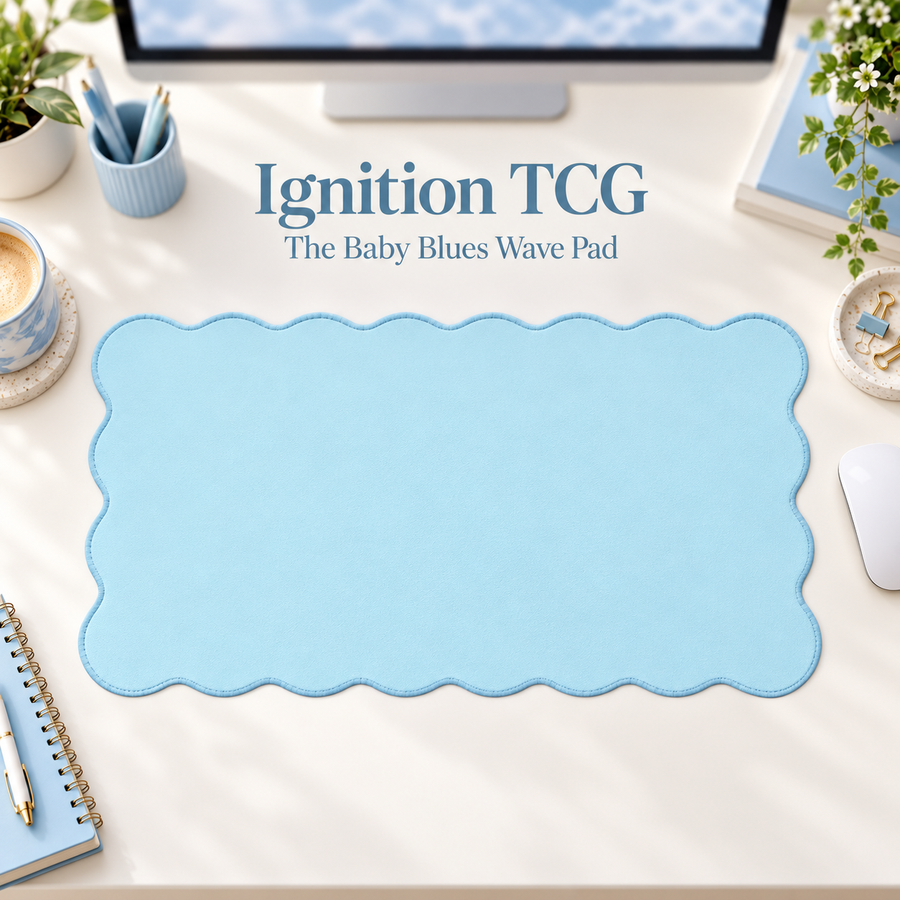 The Baby Blues Wave Pad scalloped desk mat — styled desk hero; accessories are props