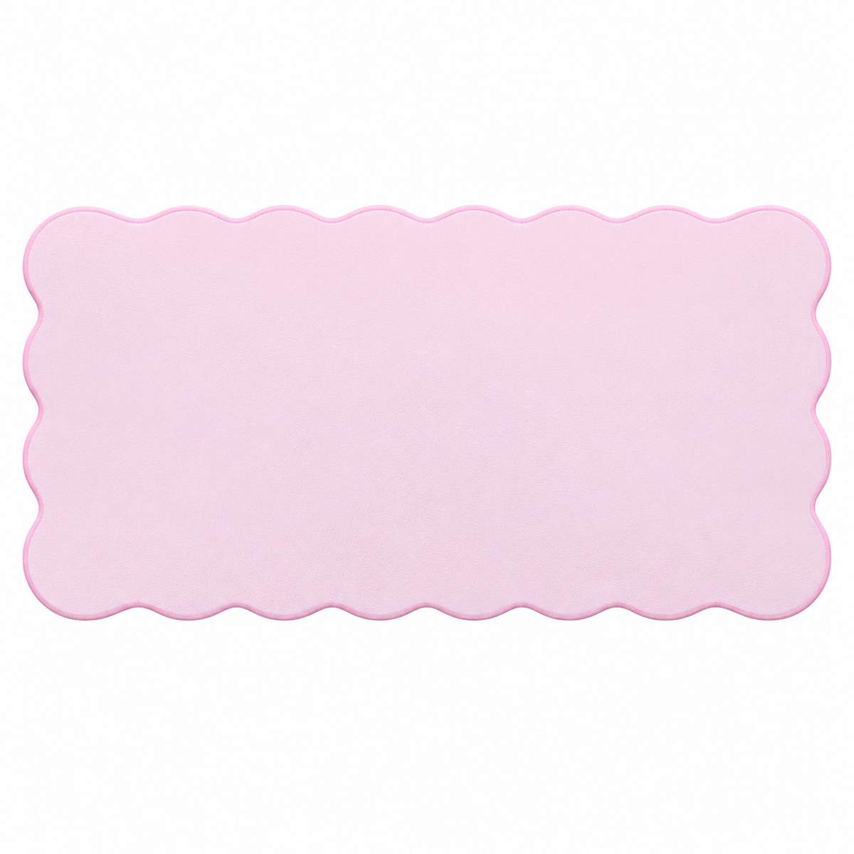 The Cotton Pink Wave Pad scalloped desk mat — unobstructed full mat