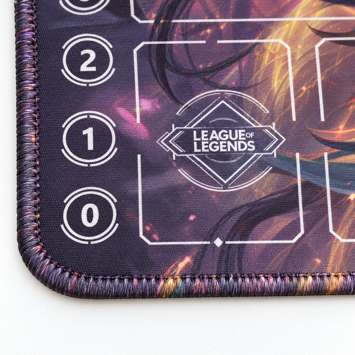 Divine Sword Irelia Riftbound Zone playmat, artwork-colored stitched-edge detail