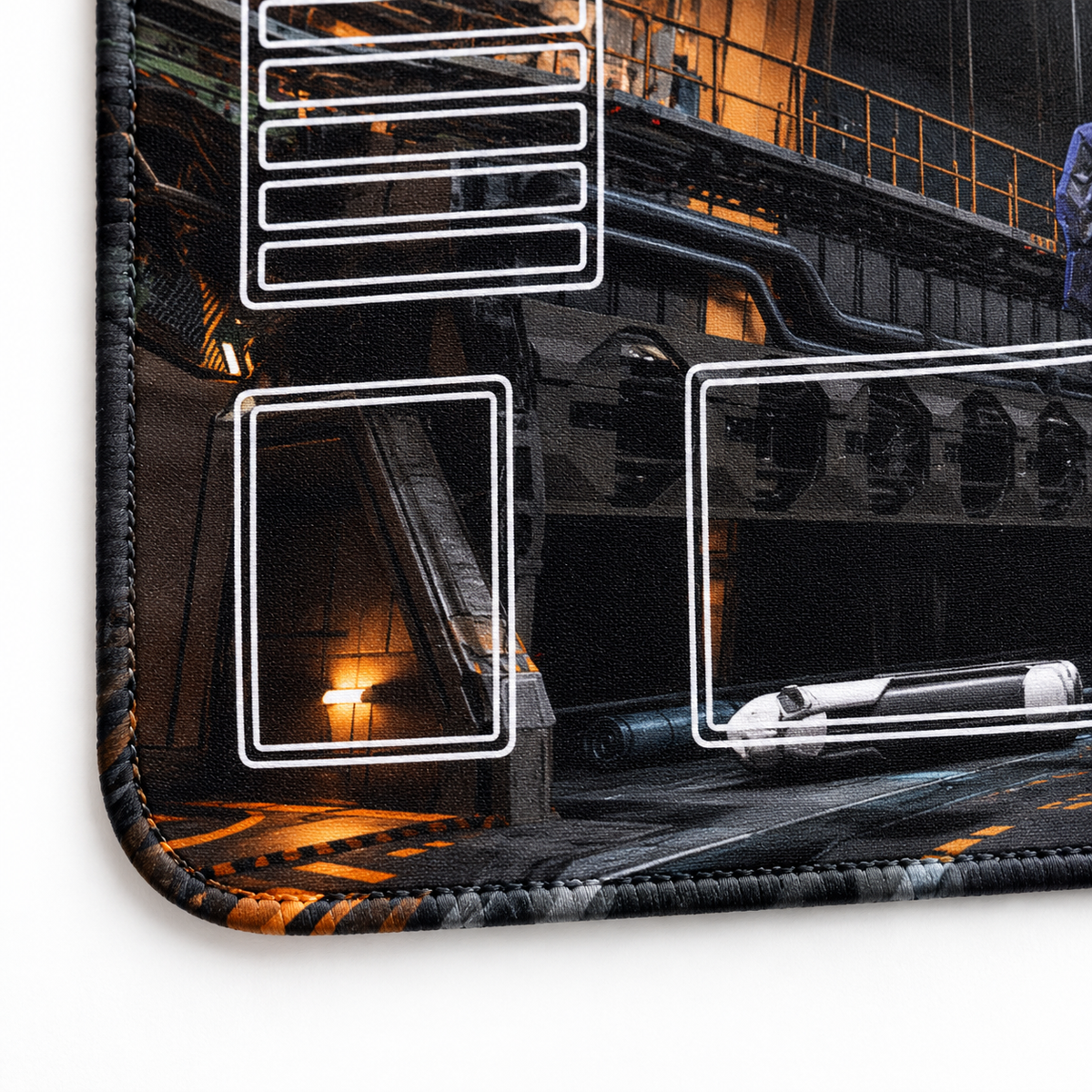 Exia hangar playmat corner showing stitching matched to adjacent artwork