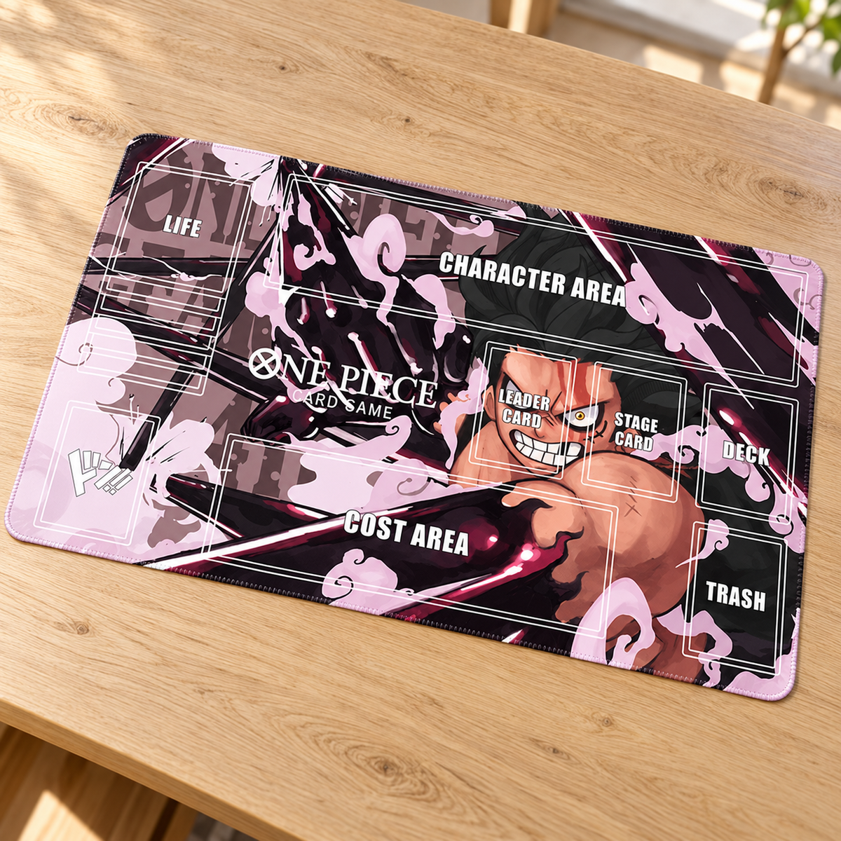 Luffy Haki Storm One Piece playmat angled on a light oak tabletop