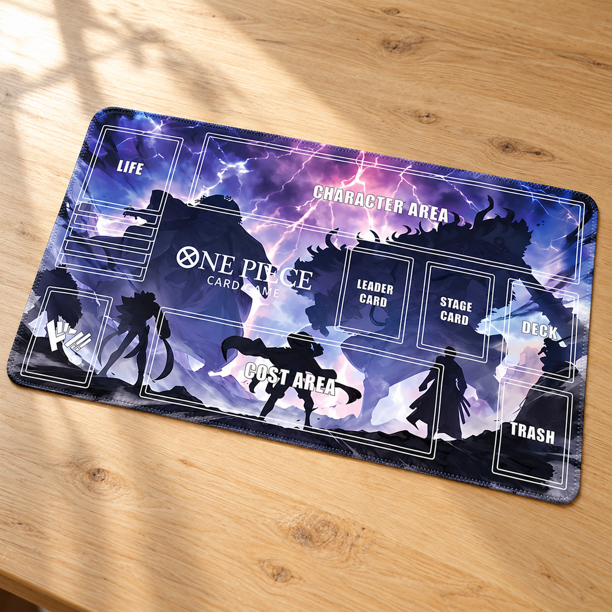 One Piece Lightning Clash playmat on a light oak table, angled view