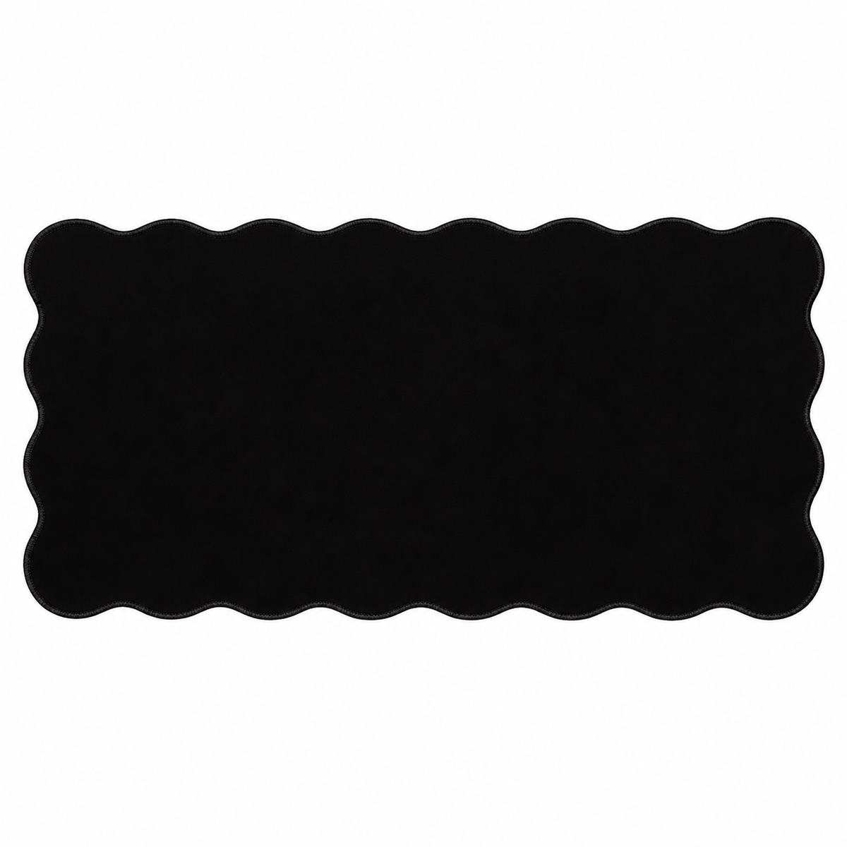 The Sleek Black Wave Pad scalloped desk mat — unobstructed full mat