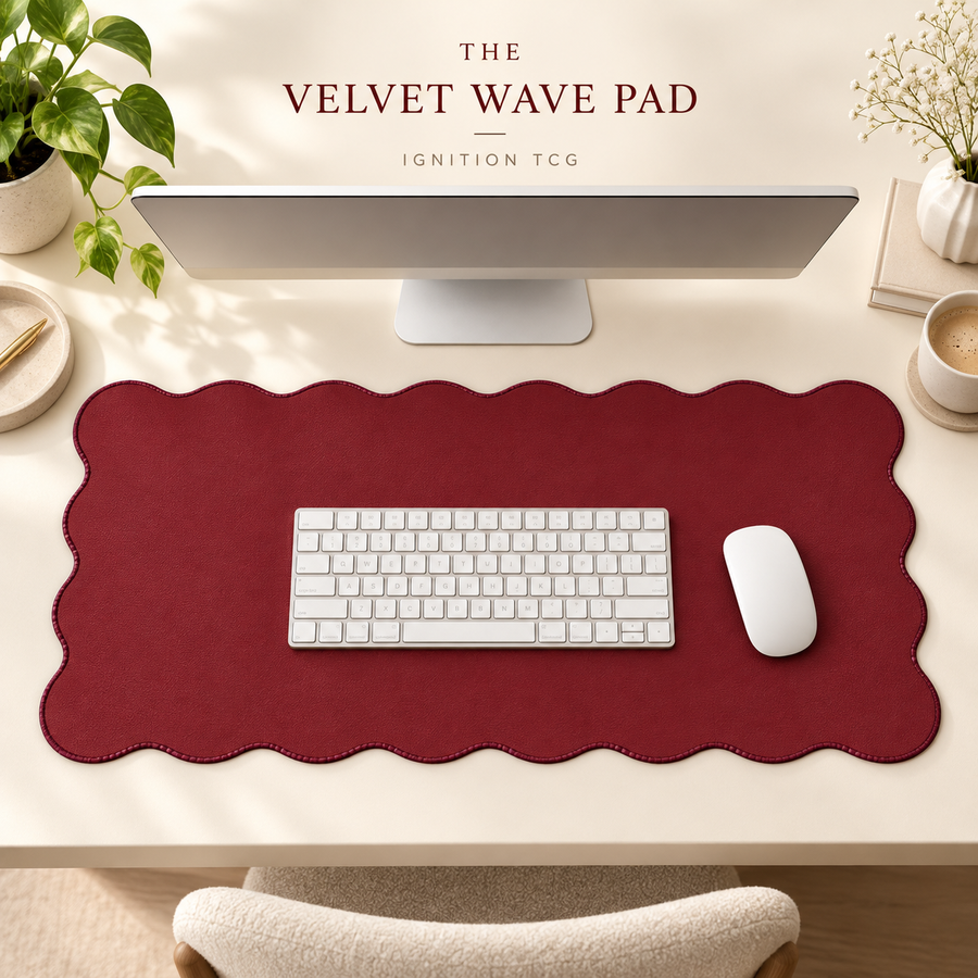 The Velvet Wave burgundy scalloped desk mat in a styled desk setup